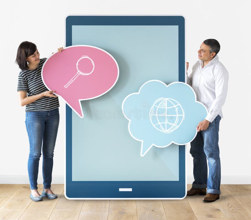 Couple holding browsing speech bubbles stock images