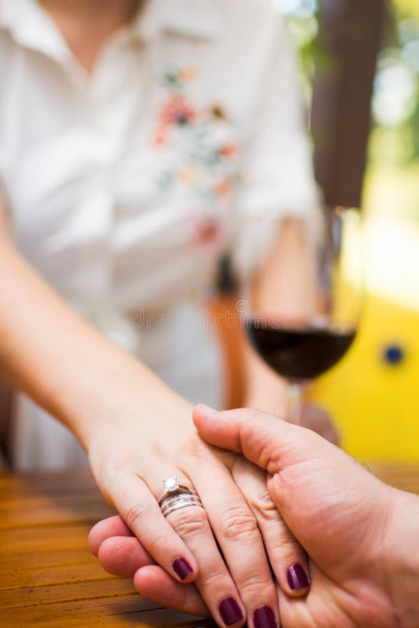 Couple Holding Hands on a Date Stock Image Image of romance