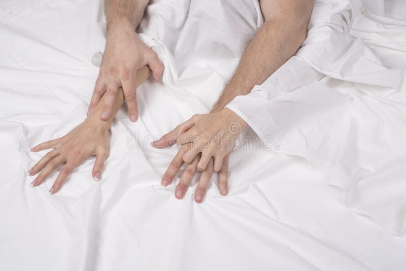 Couple Holding Hands While Having Sex In Bed Stock Image Image Of 