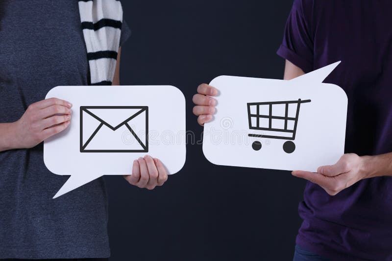 Couple holding speech bubbles stock image Couple holding speech bubbles stock image