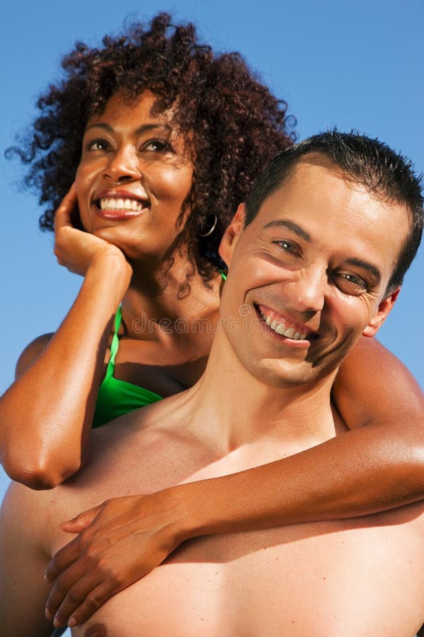 Couple - hugging each other on beach