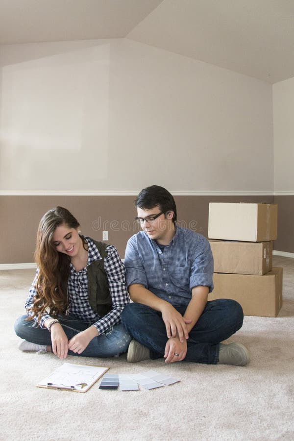 Couple inside new home stock photo. Image of concept - 66636046