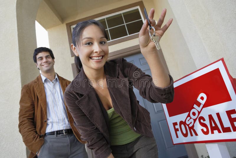 Couple With Keys To New Home