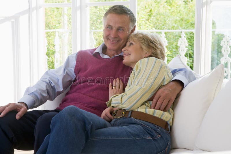 Couple in living room smiling