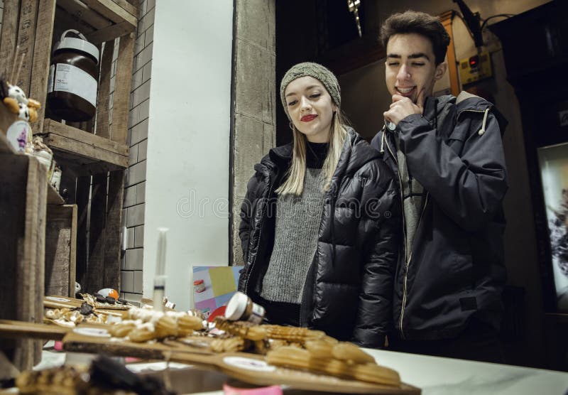 Couple looking at candy store royalty free stock images Couple looking at candy store royalty free stock images
