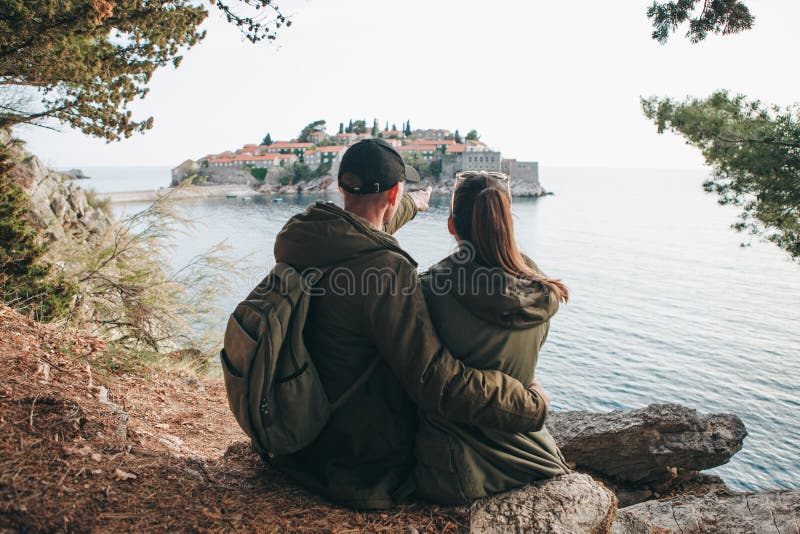 Couple looking at Sveti Stefan royalty free stock photo Couple looking at Sveti Stefan royalty free stock photo