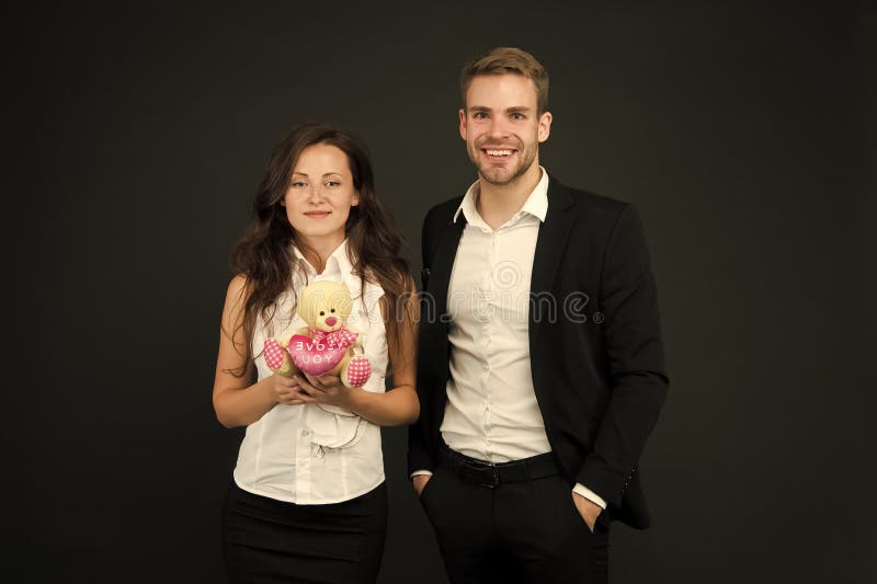 Couple in love celebrate valentines day. love and romance. gift with love. couple on romantic date. formal couple with royalty free stock image Couple in love celebrate valentines day. love and romance. gift with love. couple on romantic date. formal couple with royalty free stock image