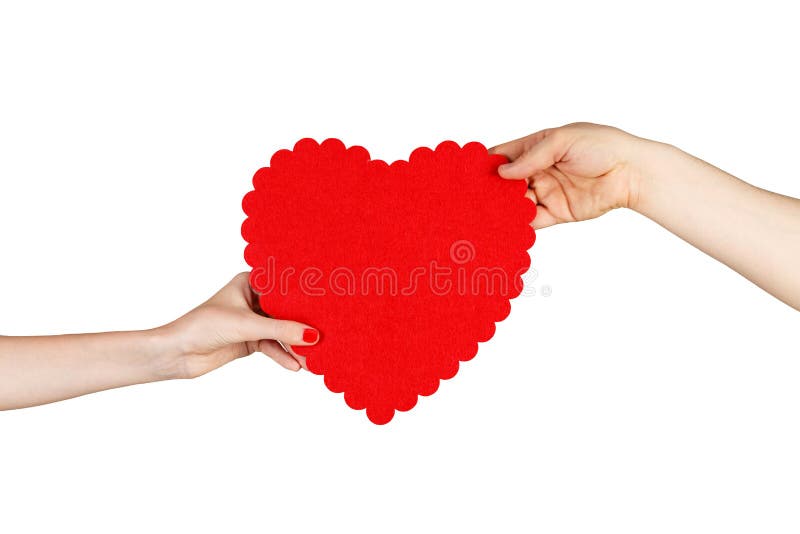 Couple in love holding a red heart in their hands