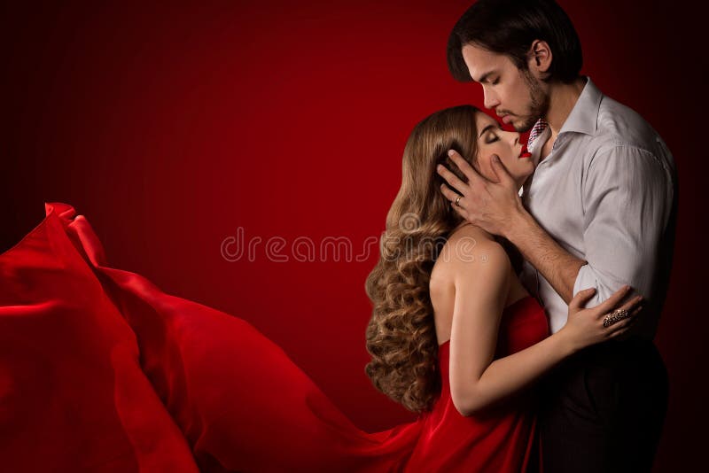 Couple Love Kiss, Romantic Man Kissing Woman in Red stock photo Couple Love Kiss, Romantic Man Kissing Woman in Red stock photo