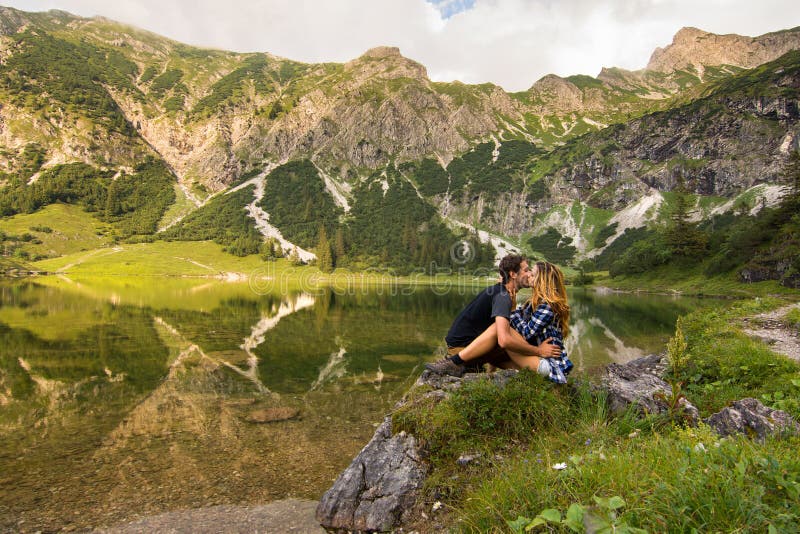Couple in Love Kissing in Front of Mountain Lake from Bavaria , Germany ...