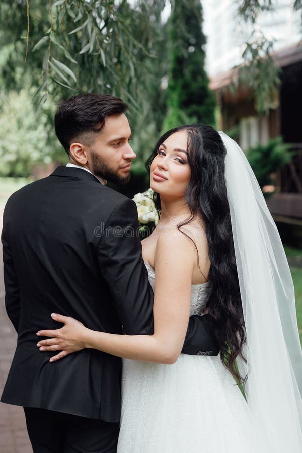 Beautiful, with a Large Bust, the Bride in a Wedding Dress Poses for the  Camera. Girl in White Dress Stock Image - Image of girl, elegant: 270787999