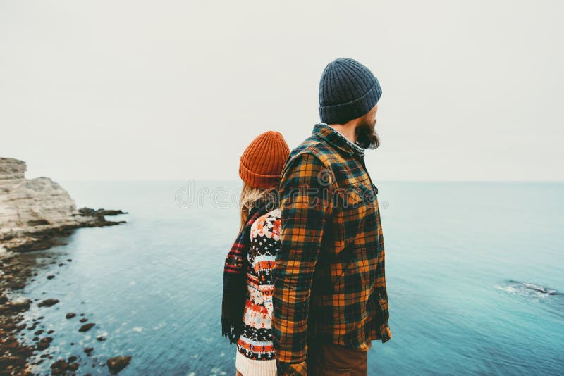 Couple lovers Man and Woman standing backs together Love and Travel