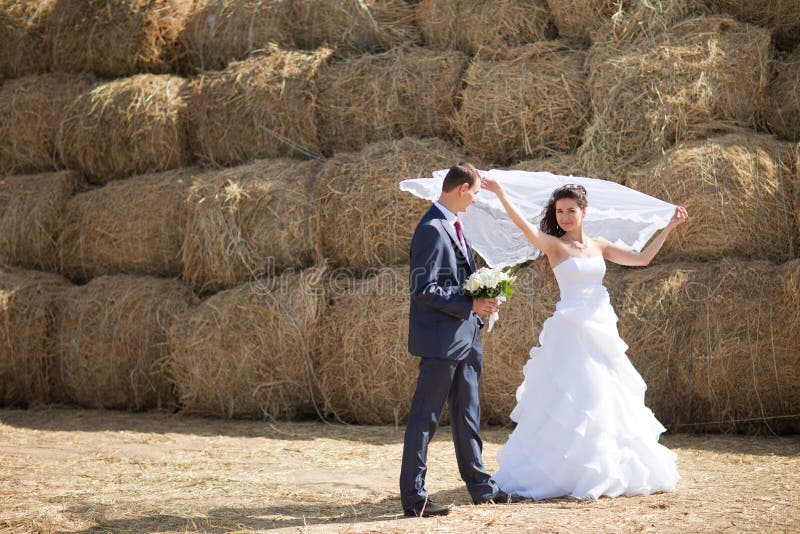 Couple near the hay stock photo. Image of rural, autumn - 42269518