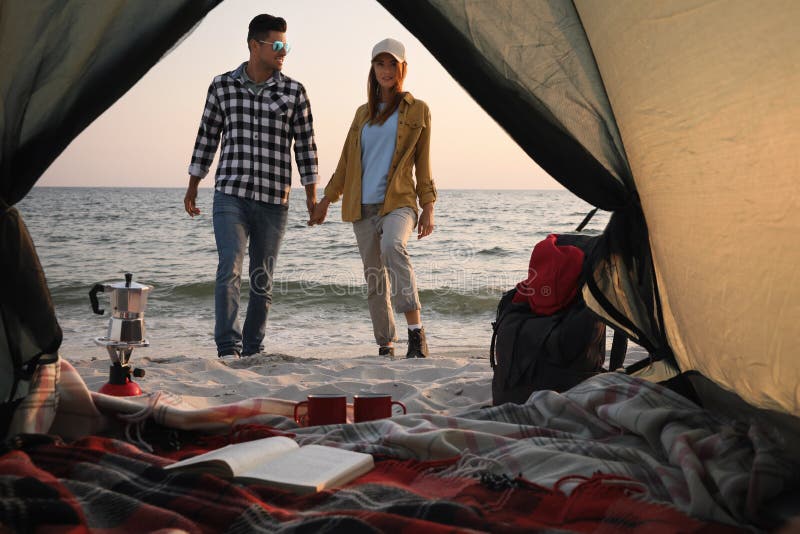 Couple Near Sea At Sunset View From Camping Tent Stock Image Image