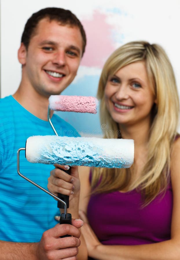 Couple painting a bedroom. stock photo. Image of heterosexual - 11151980
