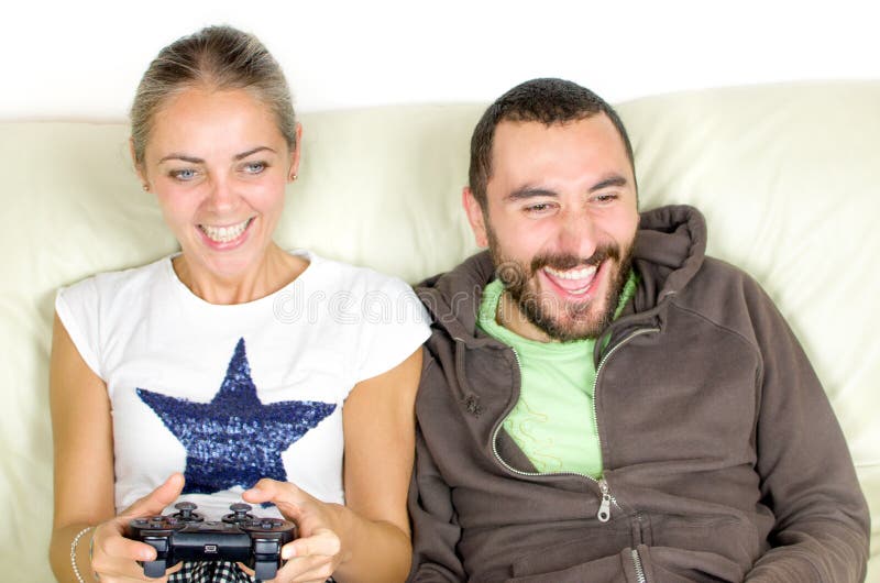 Couple play videogames man encourages girlfriend play videogames