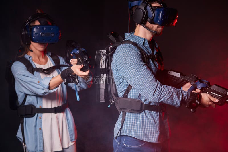 Couple Play Shooter Game with Virtual Reality and VR Glasses Stock Image - Image of device, futuristic: 162217997