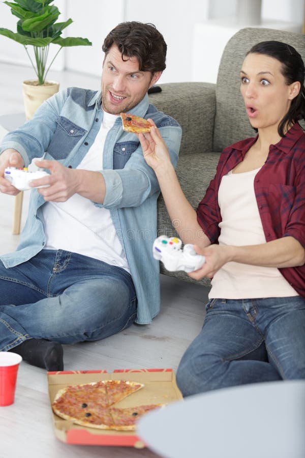 Family Eating Pizza Games Stock Photos Free & RoyaltyFree Stock