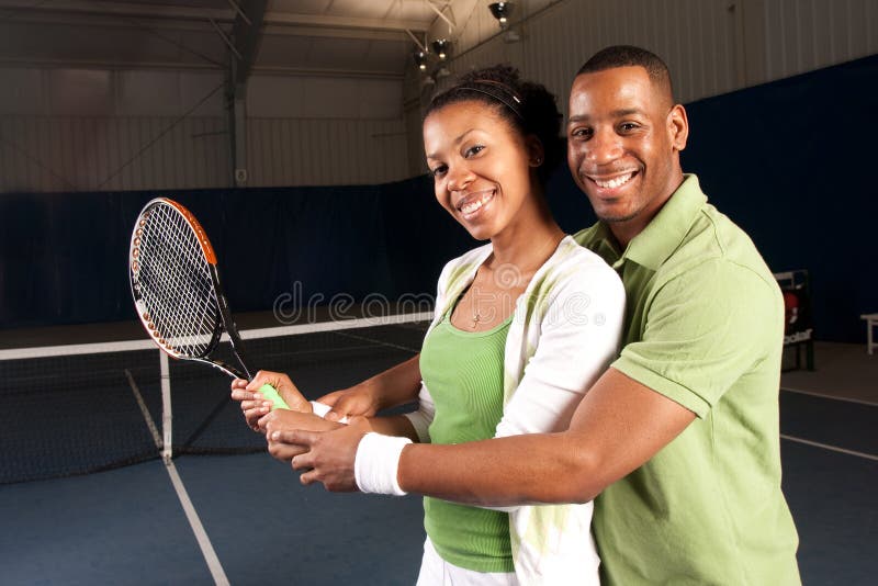 Couple playing tennis royalty free stock photos