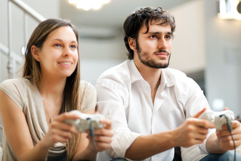 Free: International couple playing a video games Free Photo 
