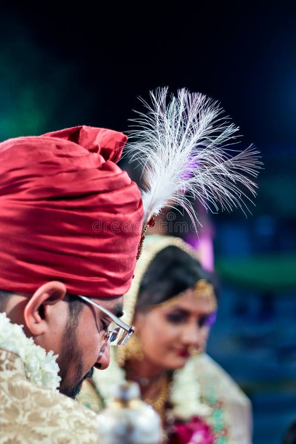 Indian wedding couple posing Stock Photos