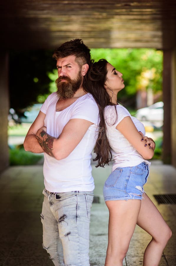 Couple problems relationship. Couple in love can not find same point of view. Girl attractive brunette bearded hipster royalty free stock photography Couple problems relationship. Couple in love can not find same point of view. Girl attractive brunette bearded hipster royalty free stock photography