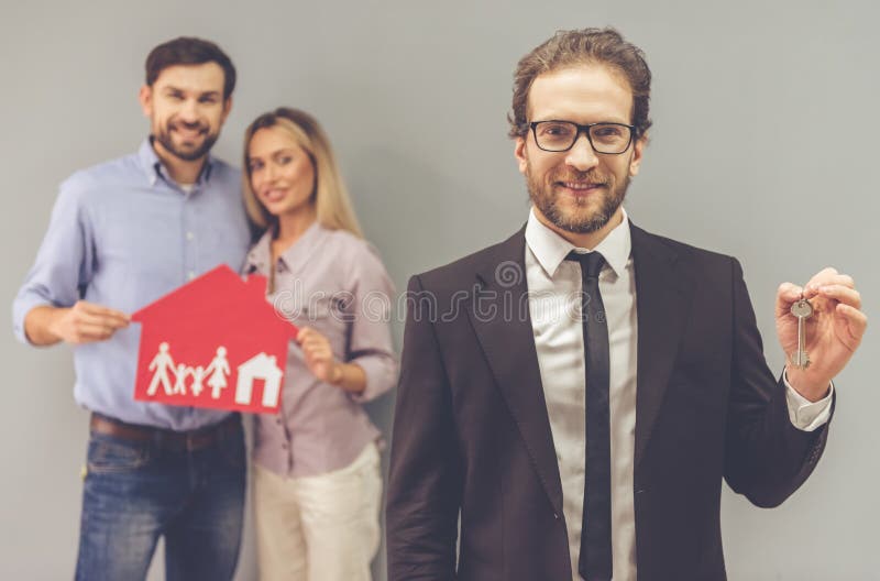 Couple and a realtor stock image Couple and a realtor stock image