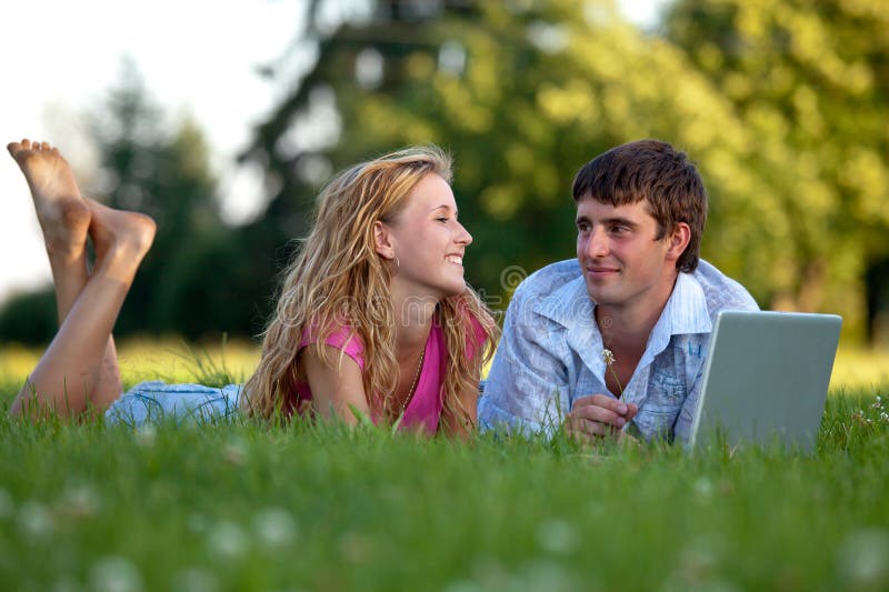 A couple relaxing in the park