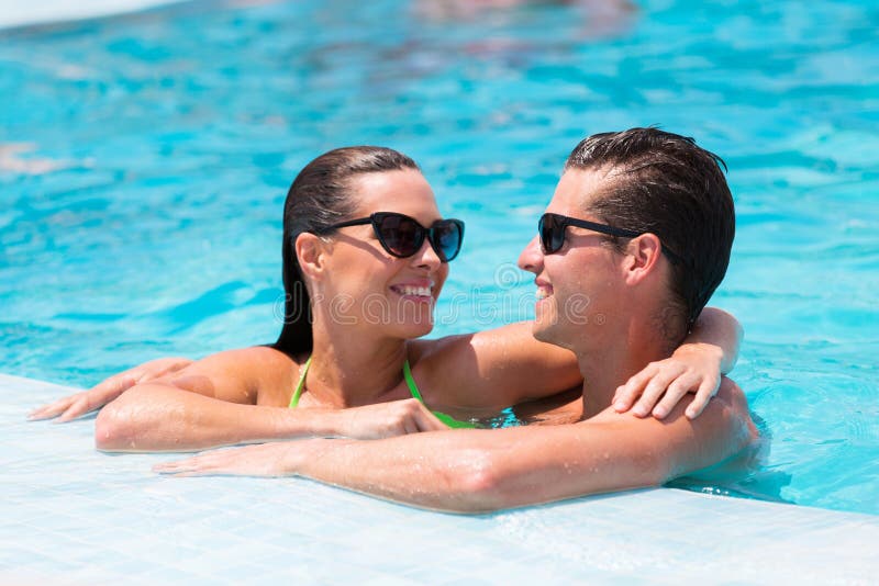 Couple relaxing pool stock photography Couple relaxing pool stock photography