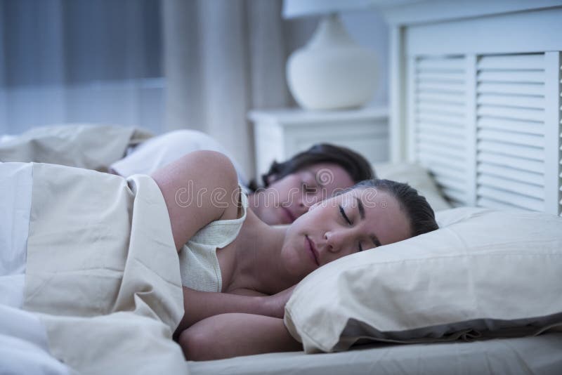 Couple Resting In Bed royalty free stock photos