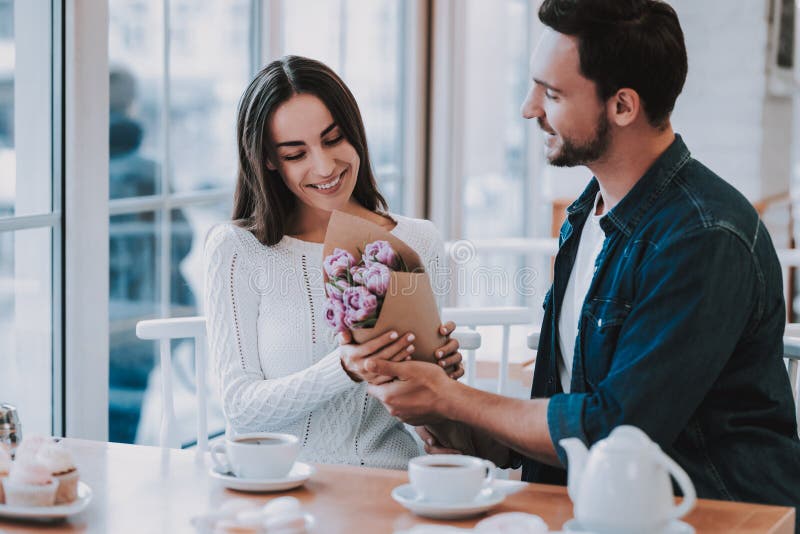 Young Couple is Resting in Cafe royalty free stock images Young Couple is Resting in Cafe royalty free stock images