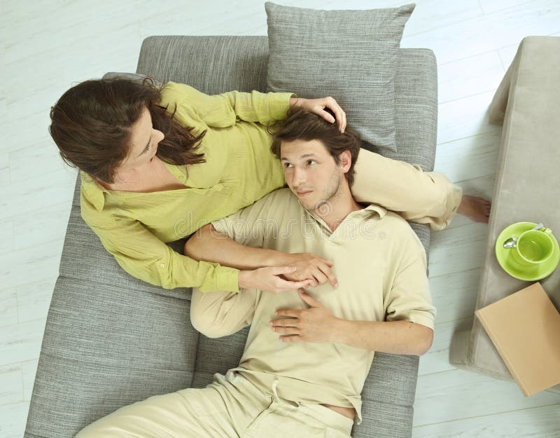 Couple resting a home royalty free stock images