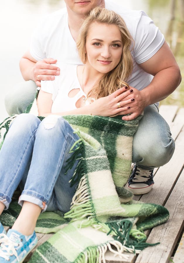 Couple resting in the park stock photos