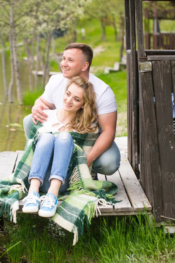 Couple resting in the park royalty free stock images