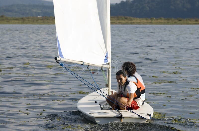 Couple Sailing on Lake - Horizontal