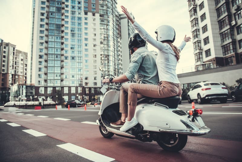 Couple on scooter stock photo. Image of freedom, adult - 97092308