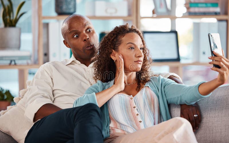 Couple Selfie And Funny Face On Sofa In Home Living Room Bonding Or