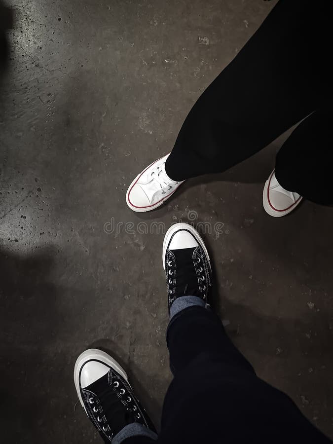 Couple Shoes for the Bride Hanging on the Lamp at the Hotel Stock Photo