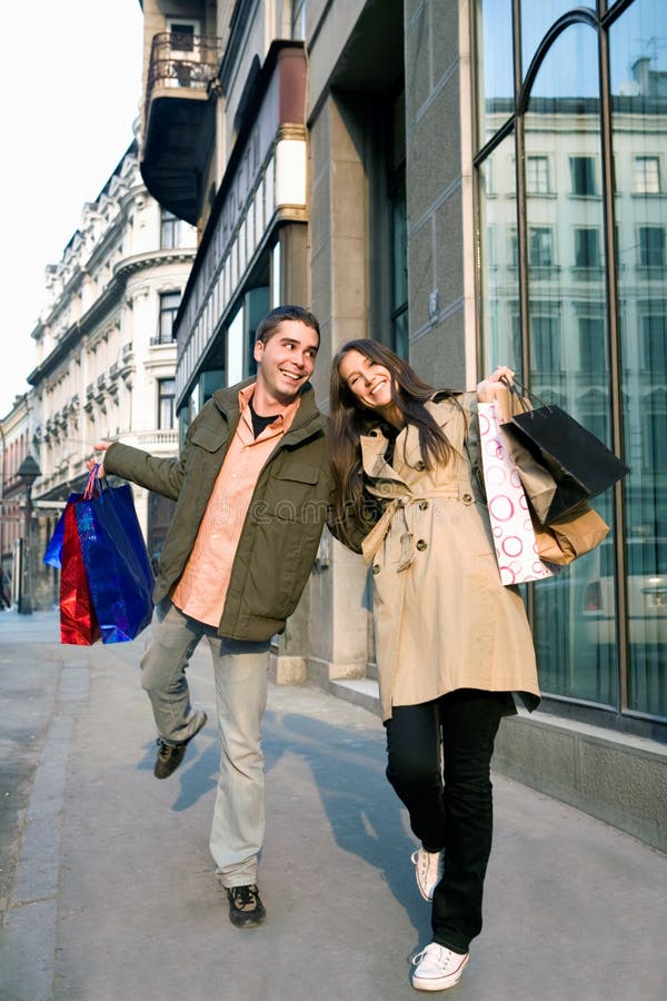 Couple in love enjoying holiday shopping. Couple in love enjoying holiday shopping