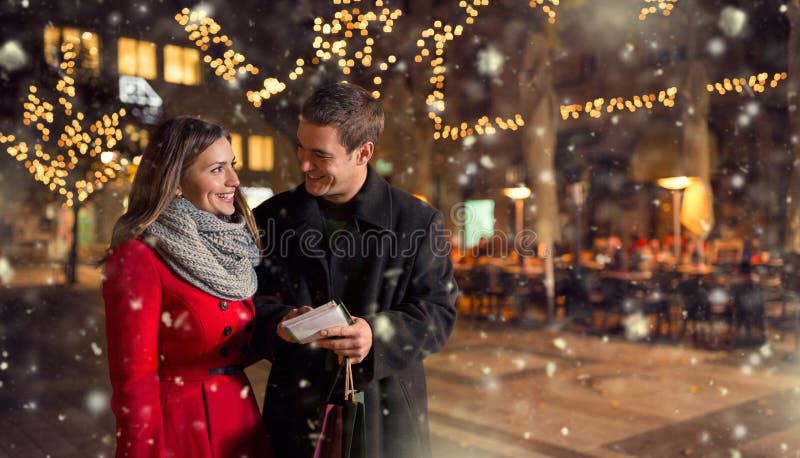 Couple with shopping list for Christmas royalty free stock image