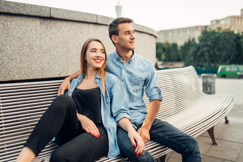 Dating Couple Sitting Bench City Park Stock Photo by ©nd3000 193063306
