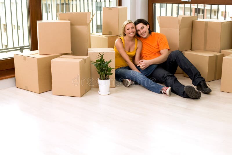 Couple sitting in new home