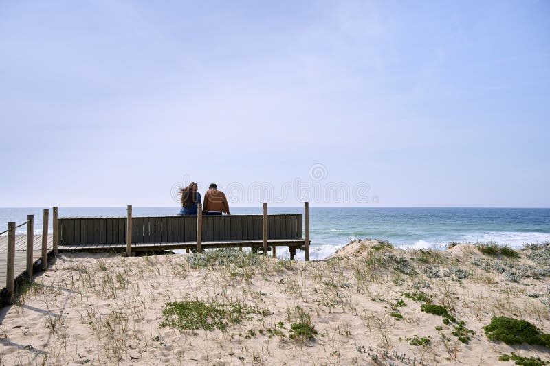 Couple talking near the beach royalty free stock image Couple talking near the beach royalty free stock image