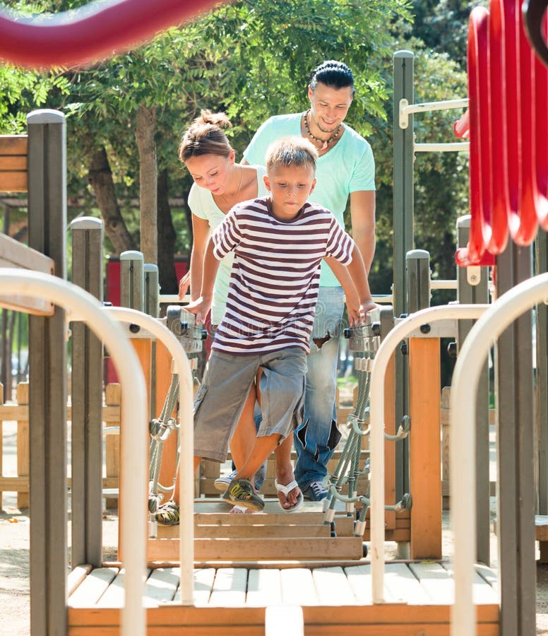 Couple Together with Teenager the Obstacle Course Stock Image