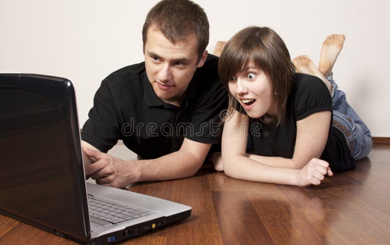 Couple using a laptop