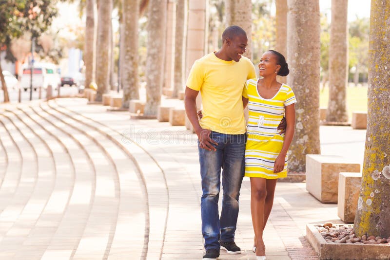 Couple walking urban street stock image Couple walking urban street stock image