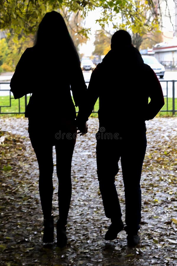 A couple walks royalty free stock photo A couple walks royalty free stock photo