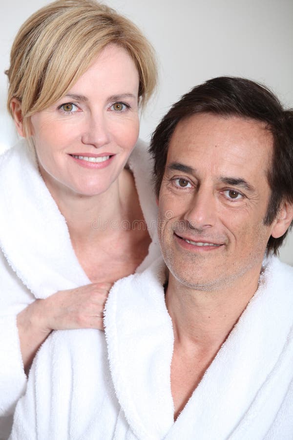 Couple wearing bath robes stock image. Image of shot 25435169
