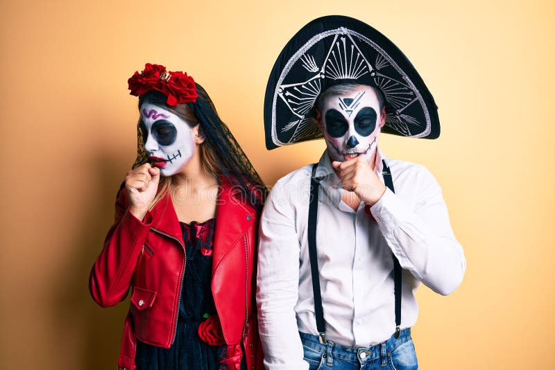 Couple Wearing Day of the Dead Costume Over Yellow Feeling Unwell and ...