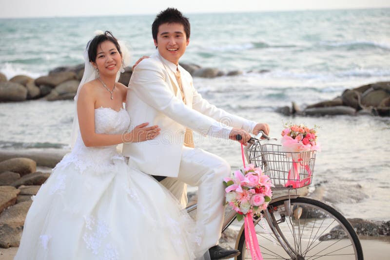 Couple of young man and woman in wedding suit